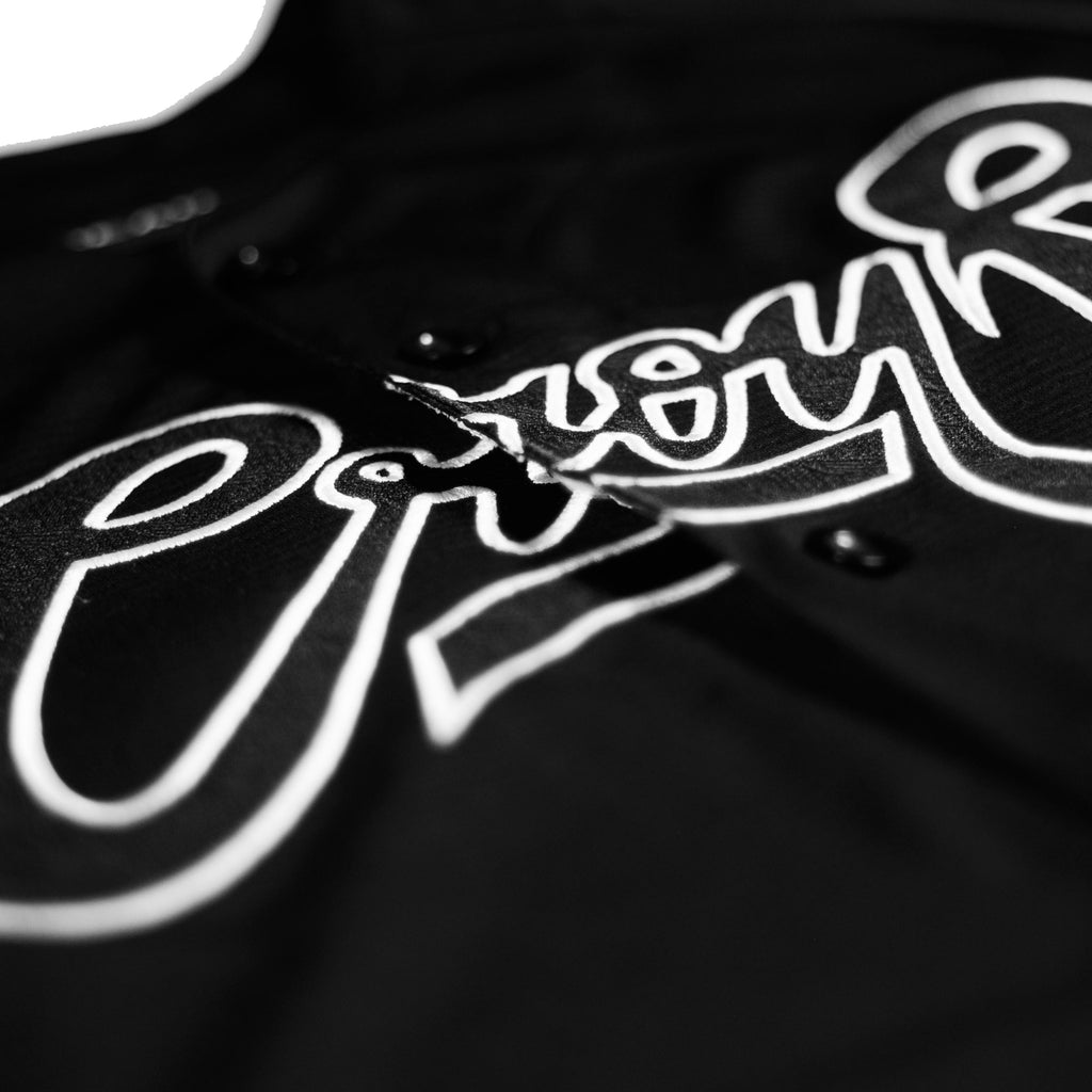 Classic B&W jersey by Crowdead. Front Crow signature embroidery closeup