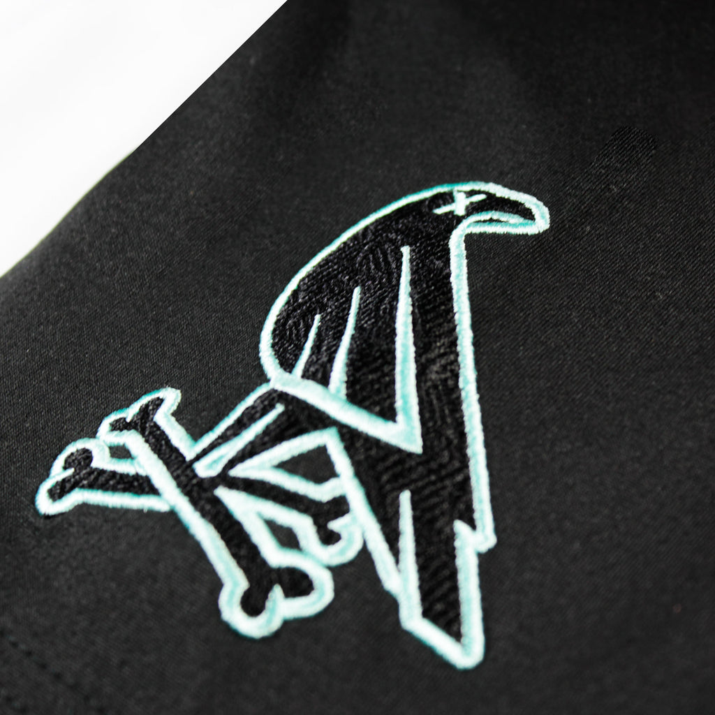 Black mint jersey by Crowdead. Sleeve embroidery close up.