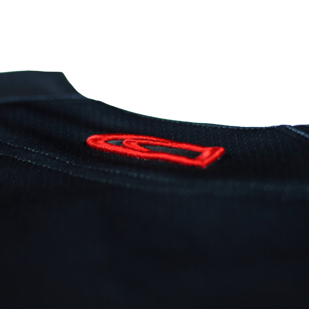 Ice jersey by Crowdead. Back CD Bullet embroidery closeup.