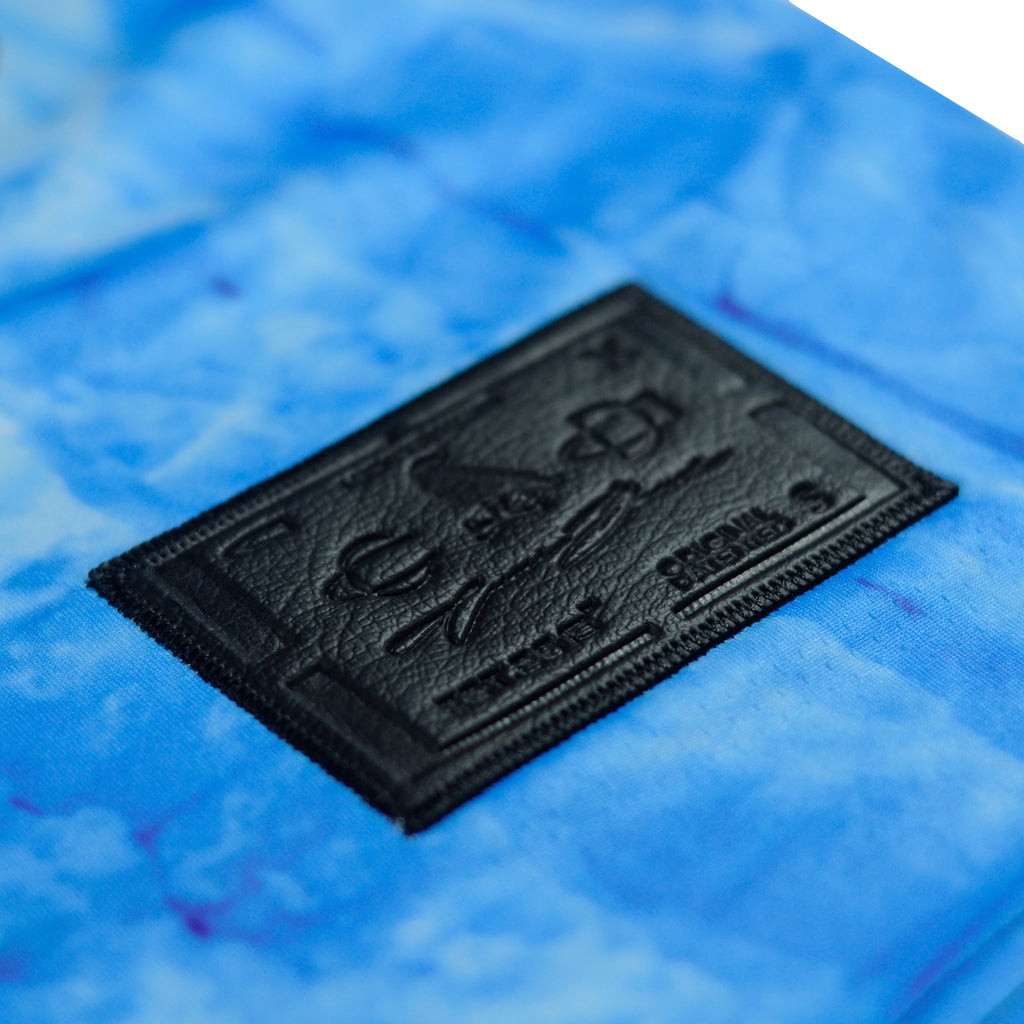 Ice jersey by Crowdead. Engraved black leather label closeup.
