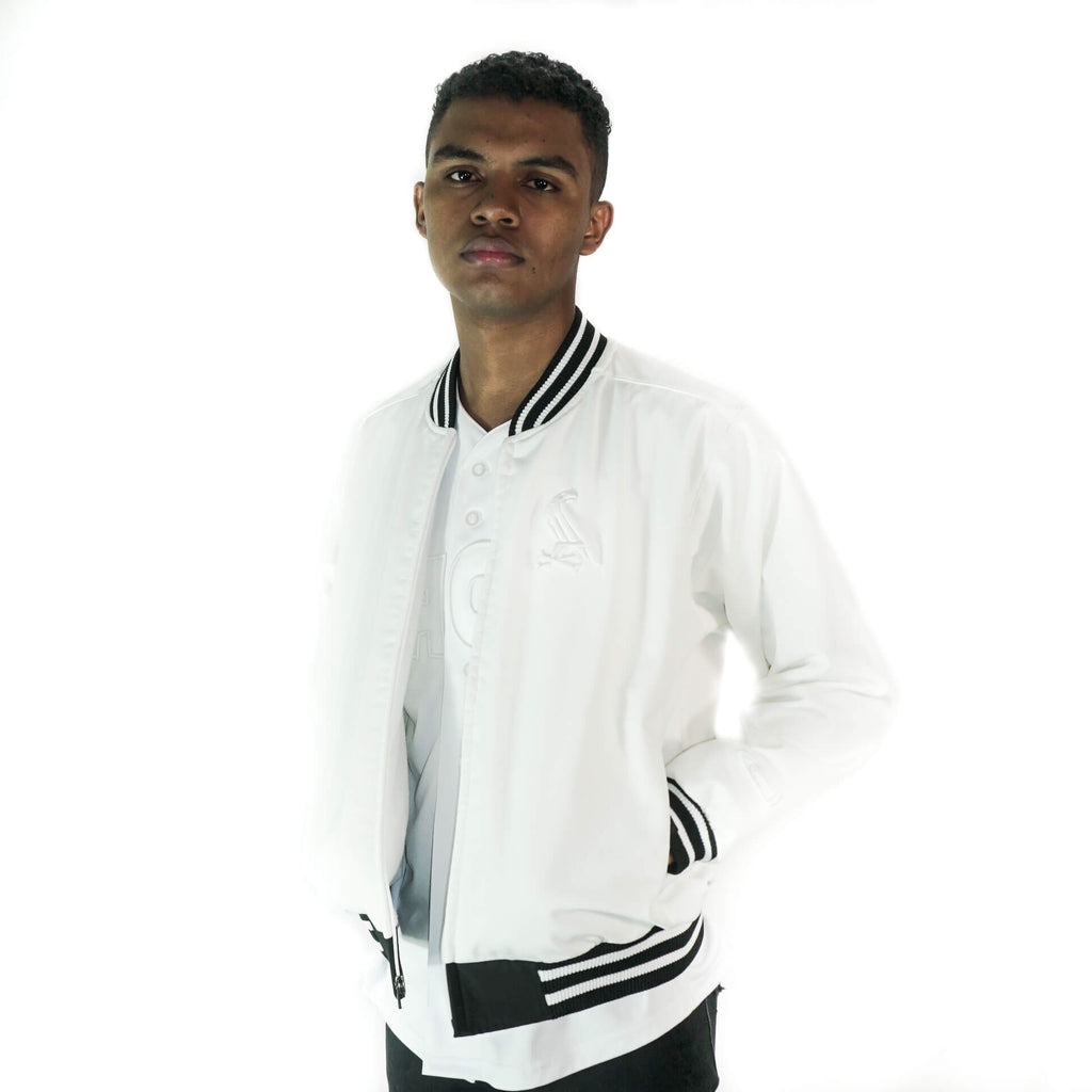 Model wearing White jacket by Crowdead.