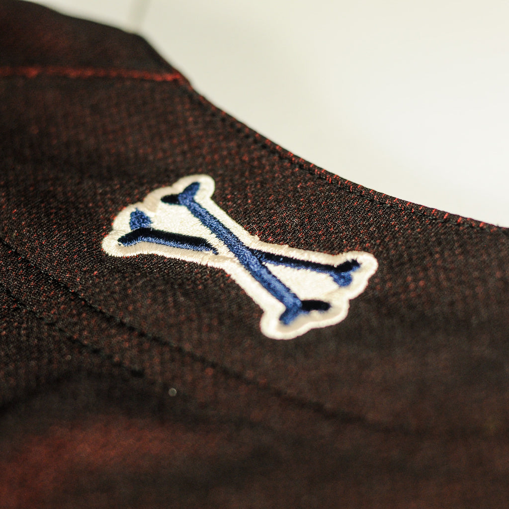 Closeup of rear logo on Tinto jersey by Crowdead streetwear.